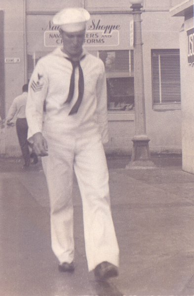 BertCHonolulu01.jpg - QM1c ComptonBert looking sharp in Honolulu. If you look close he's walking past the USO near Adams Ln... a few blocks from Aloha Tower.